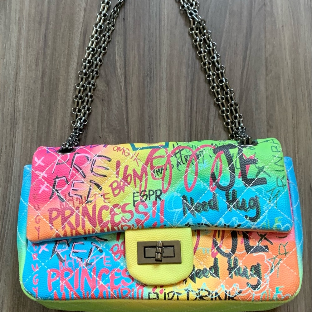This handbag has only been worn once.